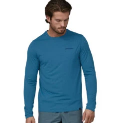 Patagonia Men's L/S Capilene Cool Daily Graphic Shirt - Waters - Boardshort Logo: Wavy Blue X-Dye 8 Patagonia Men's L/S Capilene Cool Daily Graphic Shirt - Waters - Boardshort Logo: Wavy Blue X-Dye -Outdoor Apparel Patagonia SS23 LSCapCoolGraphicWater BLWX 04