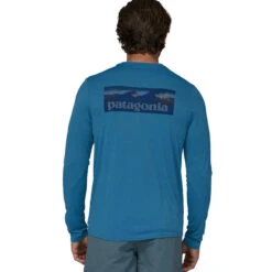Patagonia Men's L/S Capilene Cool Daily Graphic Shirt - Waters - Boardshort Logo: Wavy Blue X-Dye 9 Patagonia Men's L/S Capilene Cool Daily Graphic Shirt - Waters - Boardshort Logo: Wavy Blue X-Dye -Outdoor Apparel Patagonia SS23 LSCapCoolGraphicWater BLWX 05